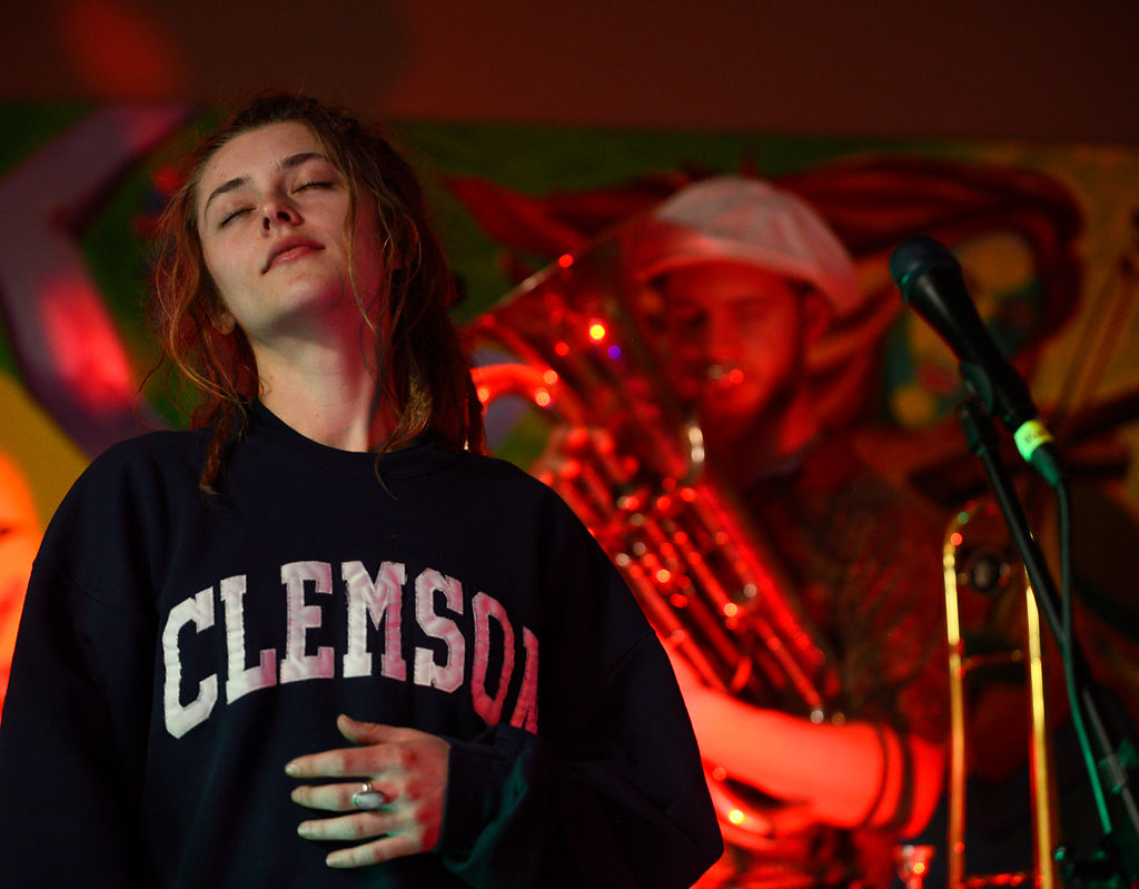 Madeline Wright dances to the music of her band